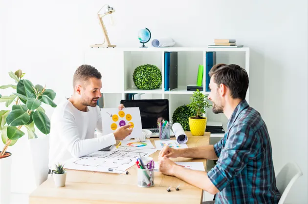 Business partners planning successful project development together
