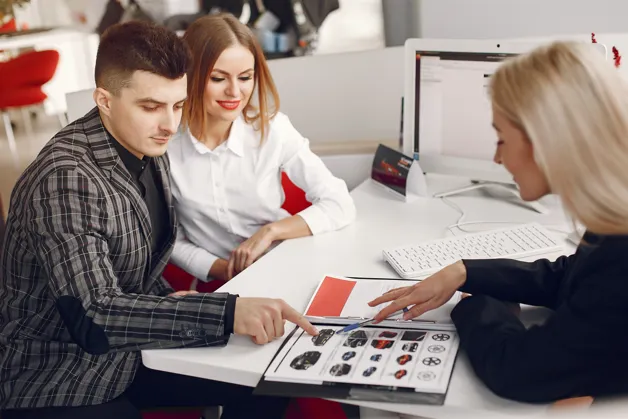 Clients reviewing design options with consultant