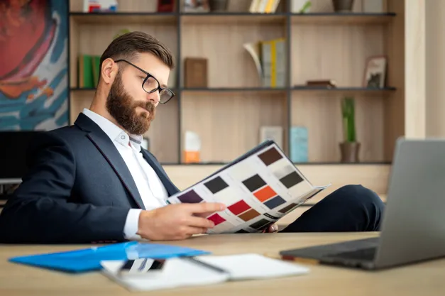 Designer reviewing branding color palette