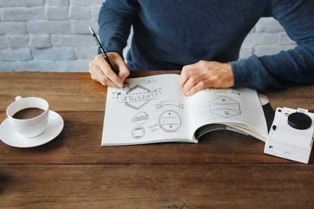 Designer sketching a logo concept